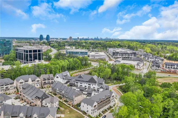 a view of a lake with a city
