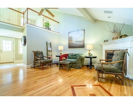 25 Maple Avenue Boxford, MA 01921 - Photo 12 of 36 a living room with furniture and a fireplace