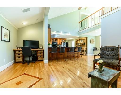 25 Maple Avenue Boxford, MA 01921 - Photo 13 of 36 a living room with furniture and a flat screen tv