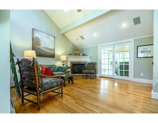 25 Maple Avenue Boxford, MA 01921 - Photo 14 of 36 a living room with furniture and a fireplace