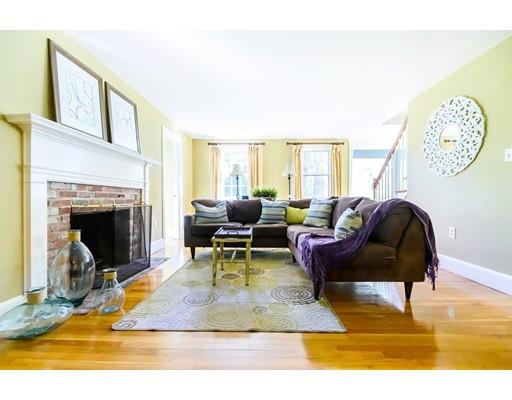 25 Maple Avenue Boxford, MA 01921 - Photo 18 of 36 a living room with furniture a rug and a fireplace