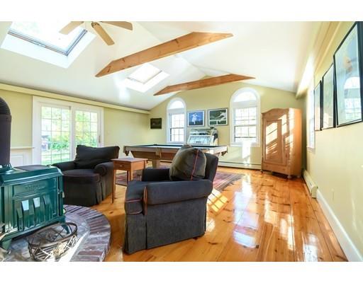 25 Maple Avenue Boxford, MA 01921 - Photo 19 of 36 a living room with furniture and a fireplace