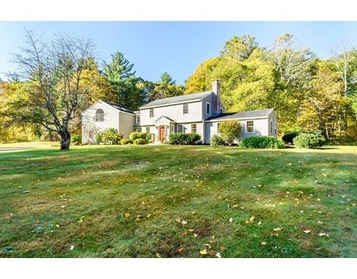 25 Maple Avenue Boxford, MA 01921 - Photo 2 of 36 a view of a white house with a big yard and potted plants