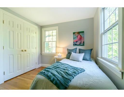 25 Maple Avenue Boxford, MA 01921 - Photo 23 of 36 a bedroom with a large bed and a window
