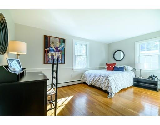 25 Maple Avenue Boxford, MA 01921 - Photo 24 of 36 a bedroom with a bed lamps and window