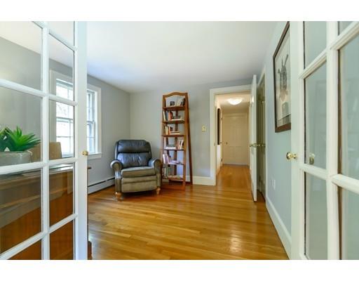 25 Maple Avenue Boxford, MA 01921 - Photo 26 of 36 a living room with furniture and a large window