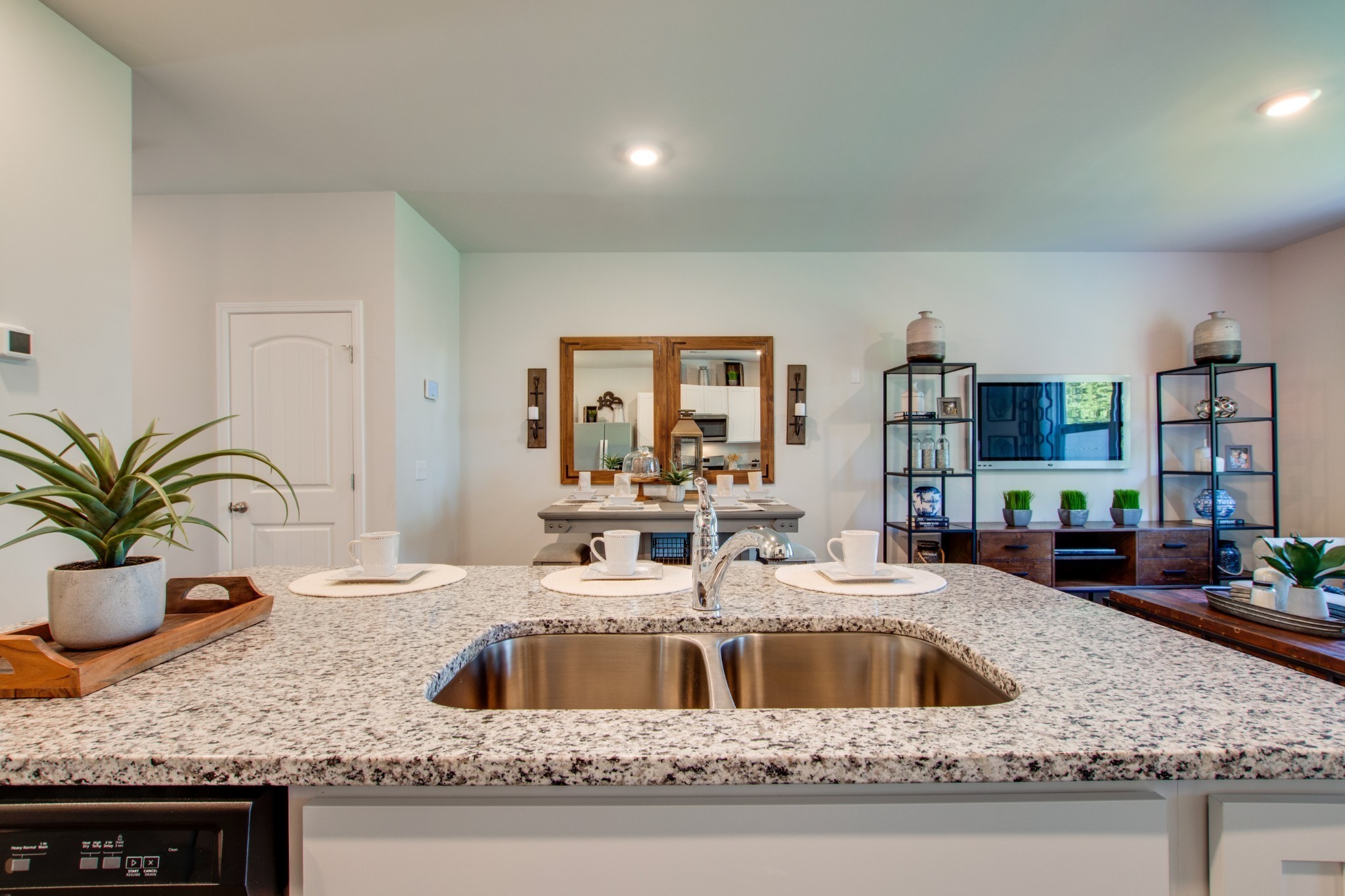642 Longtail Lane Lebanon, TN 37090 - Photo 11 of 29 a kitchen with granite countertop a sink and a wooden floor