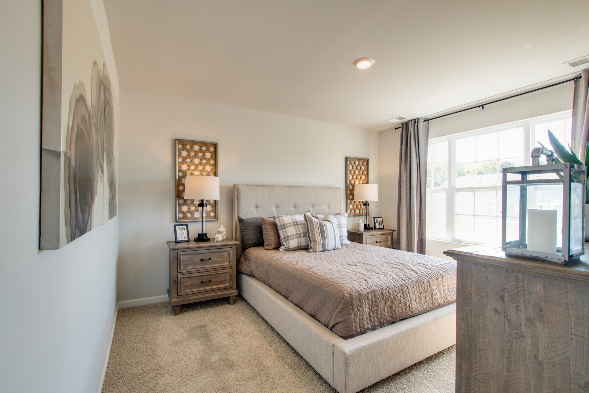642 Longtail Lane Lebanon, TN 37090 - Photo 17 of 29 a bedroom with a large bed and a large window