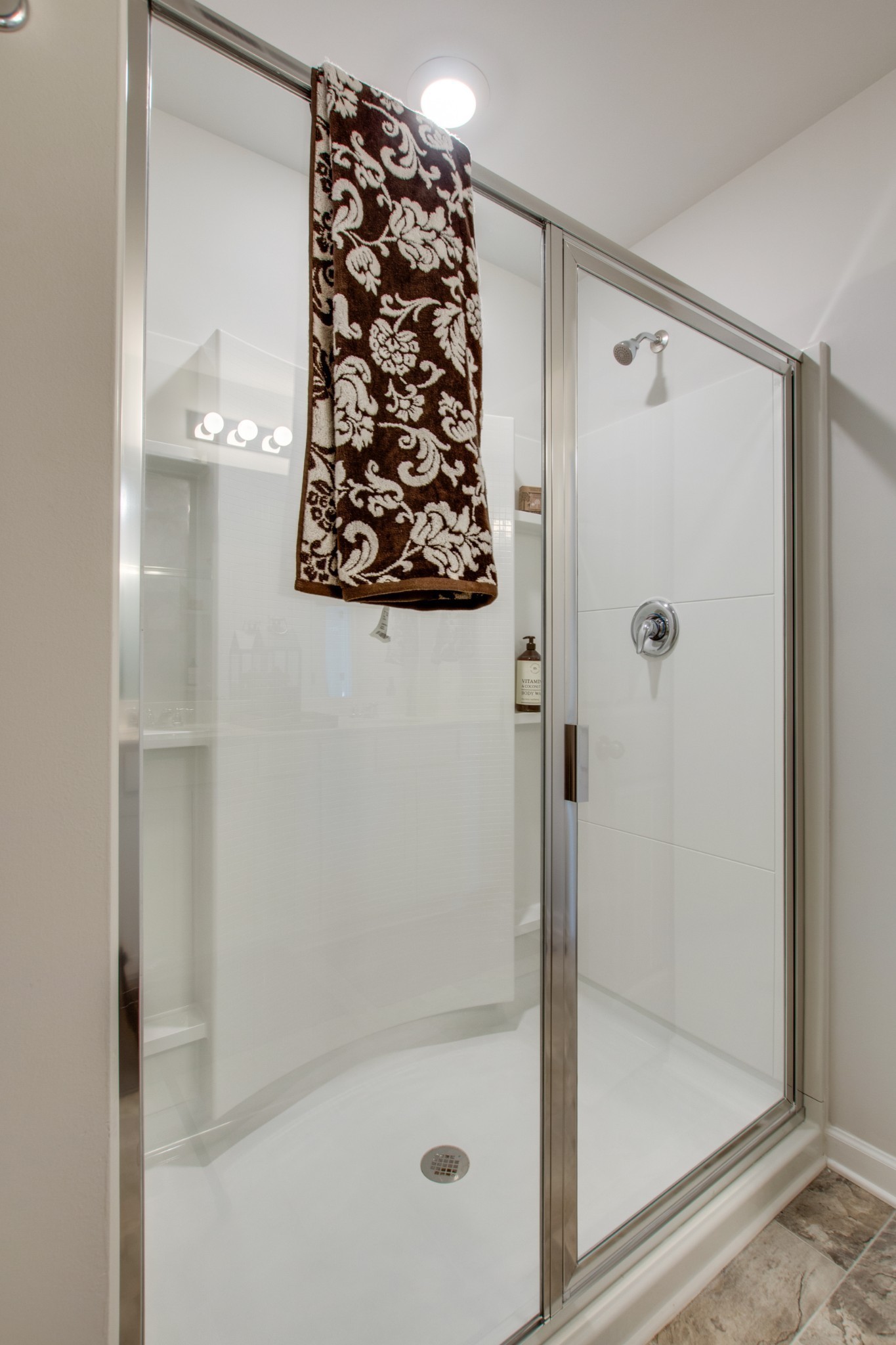 642 Longtail Lane Lebanon, TN 37090 - Photo 21 of 29 a bathroom with a shower and a glass door