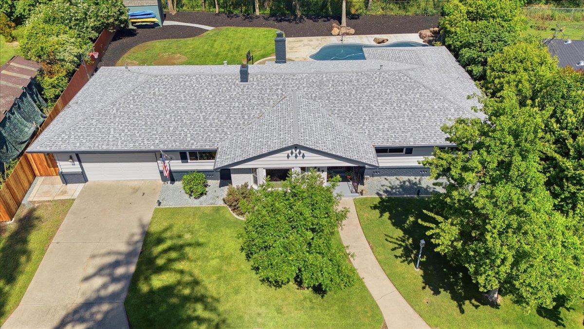 4849 Alexon Way Carmichael, CA 95608 - Photo 44 of 50 a aerial view of a house with a yard and plants
