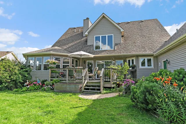 a view of a chair and table on the balcony