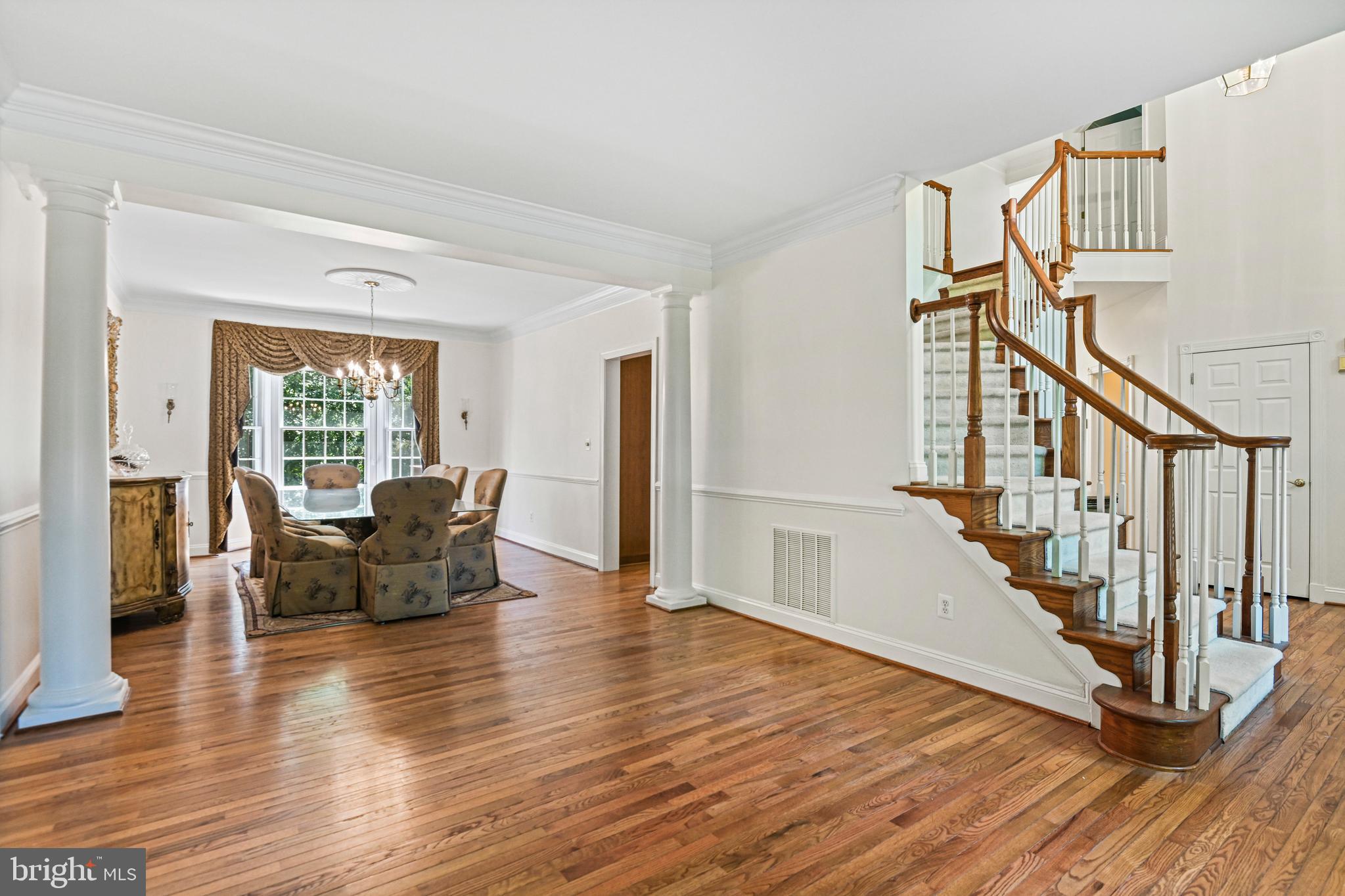10509 Dunn Meadow Road Vienna, VA 22182 - Photo 11 of 81 a living room with furniture and wooden floor