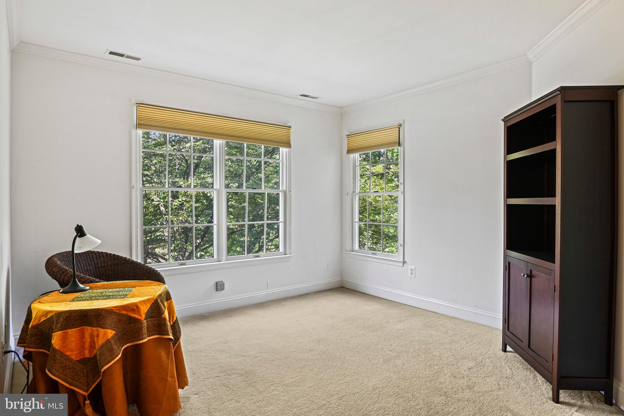 10509 Dunn Meadow Road Vienna, VA 22182 - Photo 26 of 81 a living room with furniture and a window
