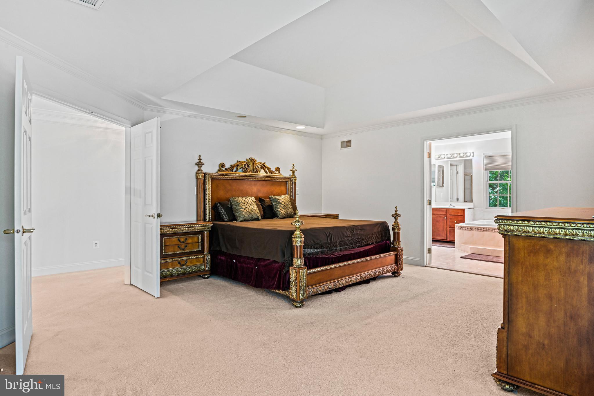 10509 Dunn Meadow Road Vienna, VA 22182 - Photo 27 of 81 a bedroom with a bed and a window