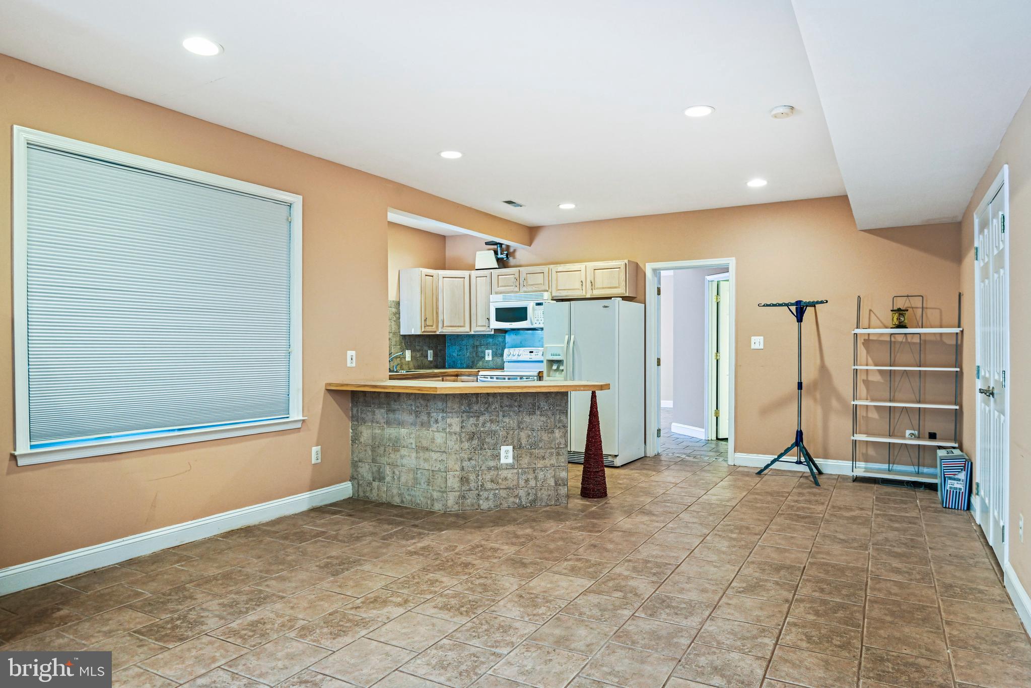10509 Dunn Meadow Road Vienna, VA 22182 - Photo 48 of 81 a view of kitchen with cabinets and refrigerator