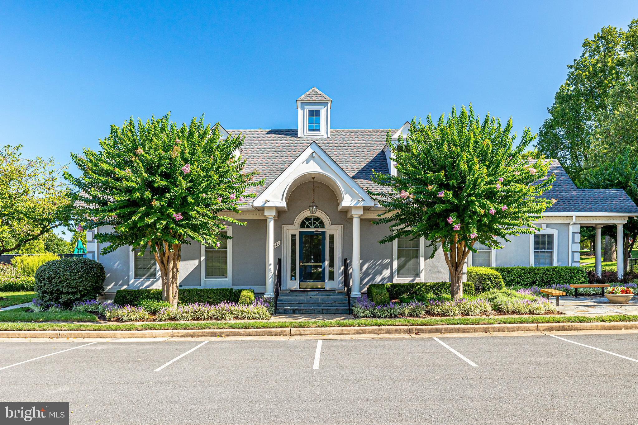 10509 Dunn Meadow Road Vienna, VA 22182 - Photo 77 of 81 a front view of a house with a yard