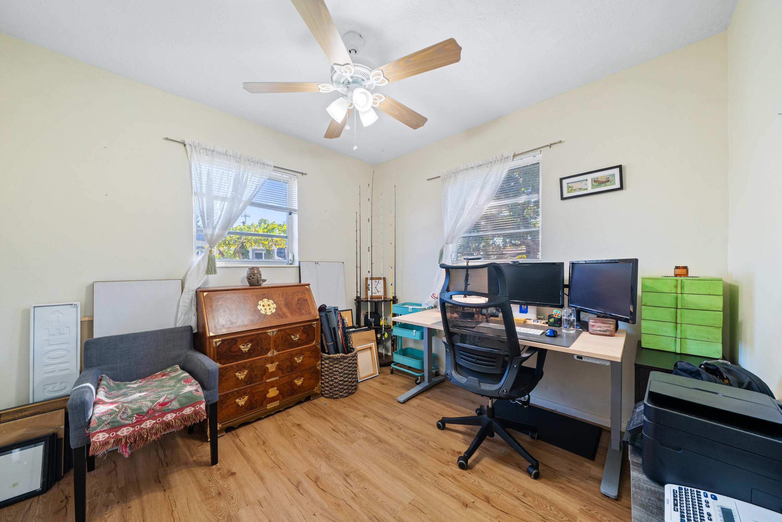 10730 Southwest 151st Street Miami, FL 33176 - Photo 19 of 26 a work room with furniture and a wooden floor