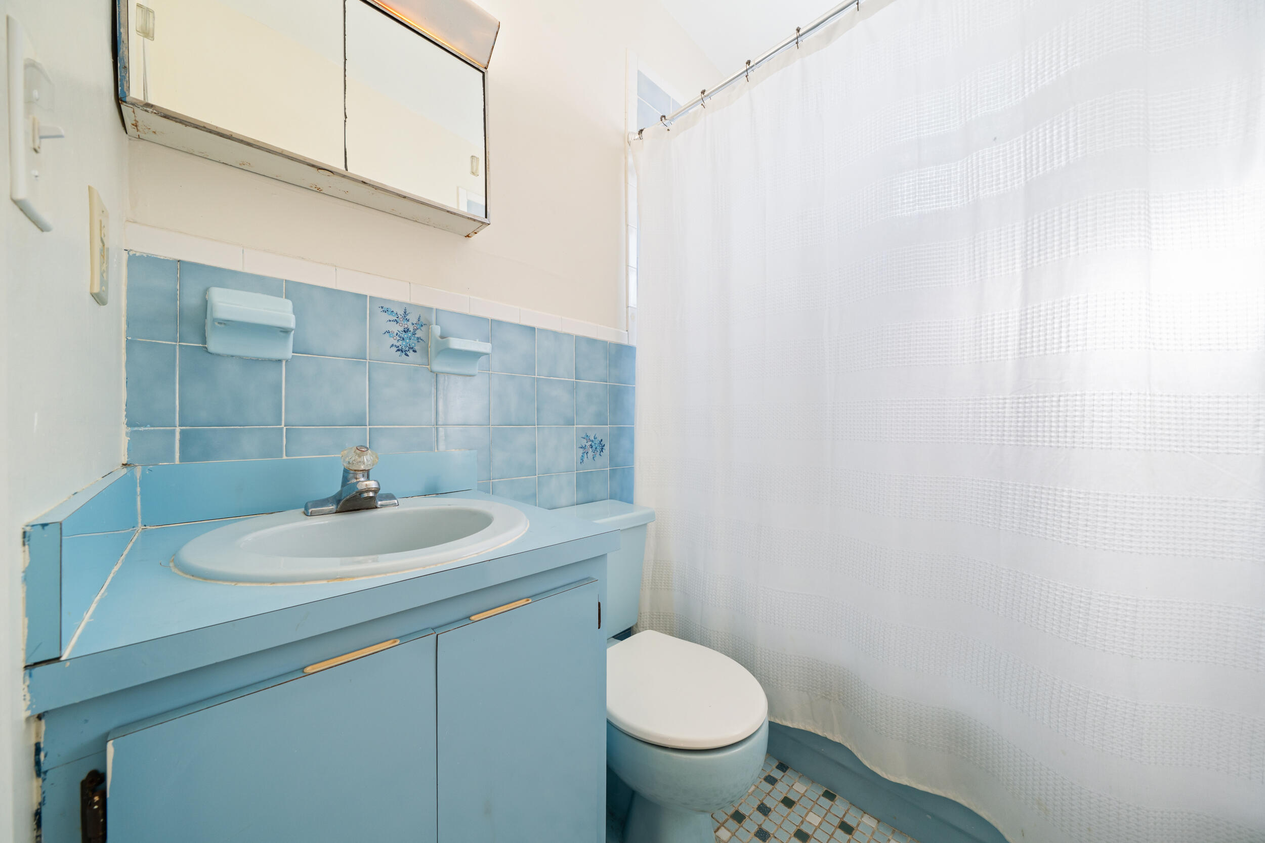 10730 Southwest 151st Street Miami, FL 33176 - Photo 21 of 26 a bathroom with a sink and a toilet