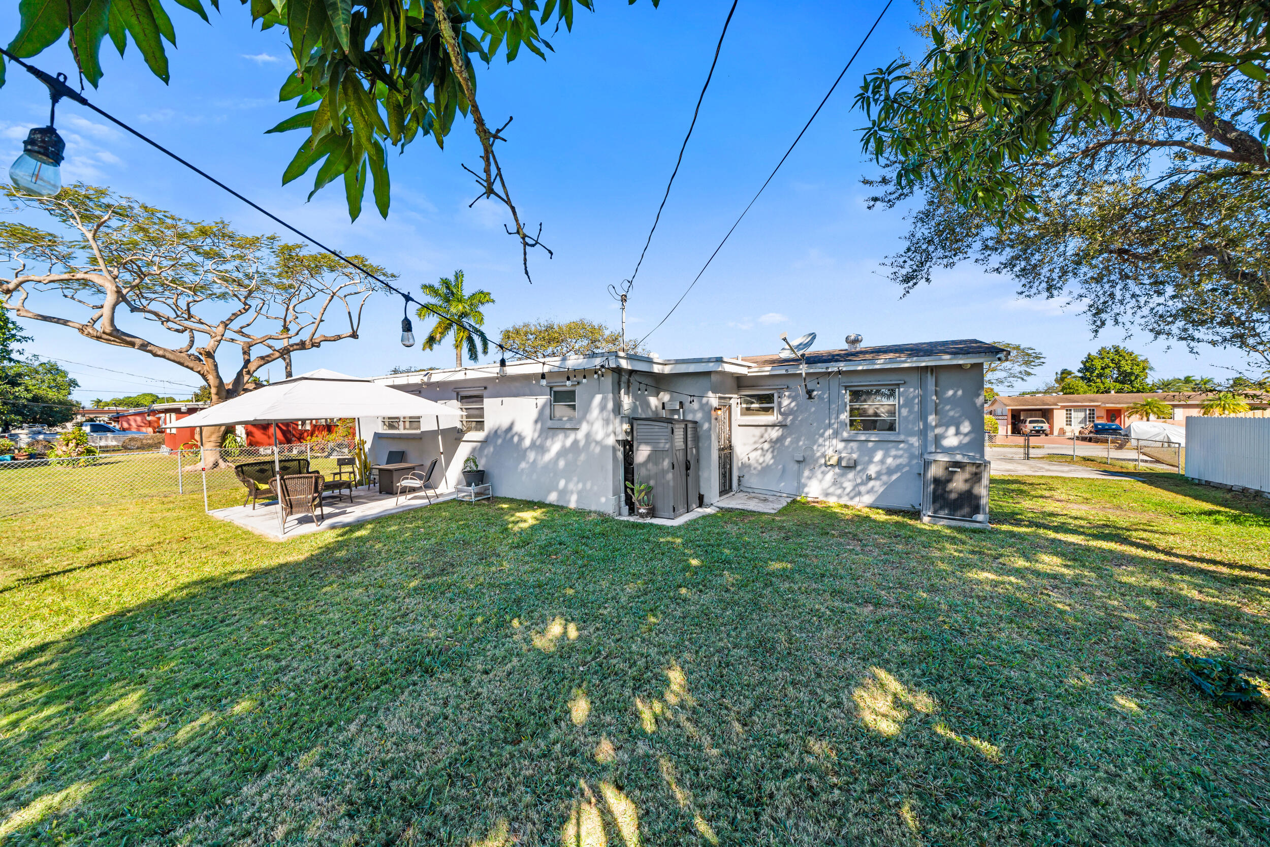 10730 Southwest 151st Street Miami, FL 33176 - Photo 26 of 26 a view of a house with a yard