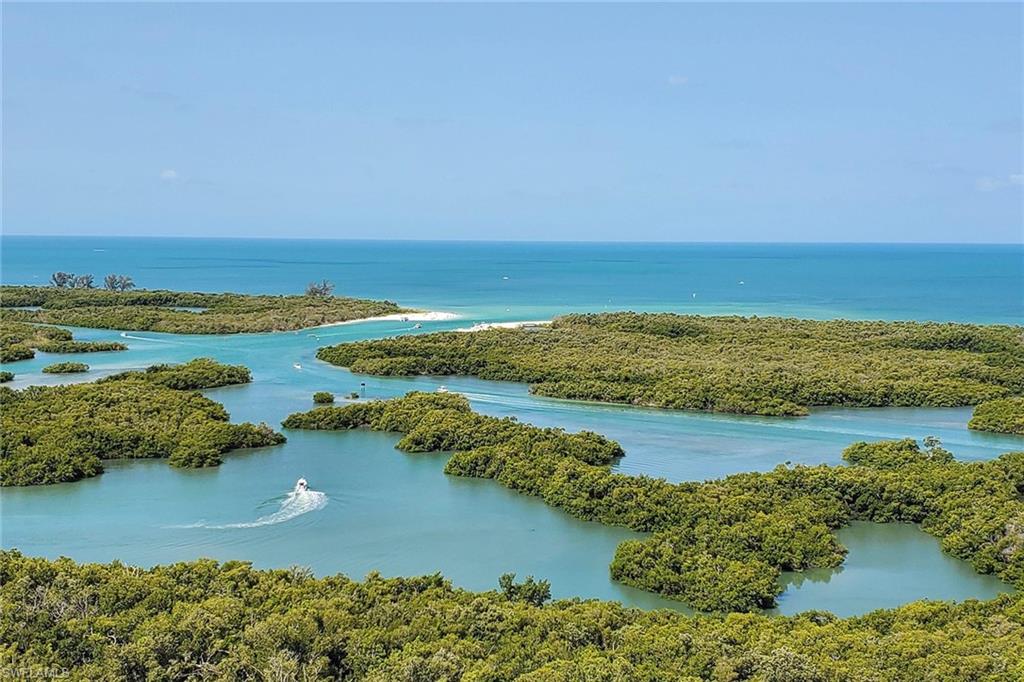 13935 Old Coast Road, Unit 2206 Naples, FL 34110 - Photo 30 of 50 Scenic waterways with direct boating access through Wiggins Pass to the Gulf beaches