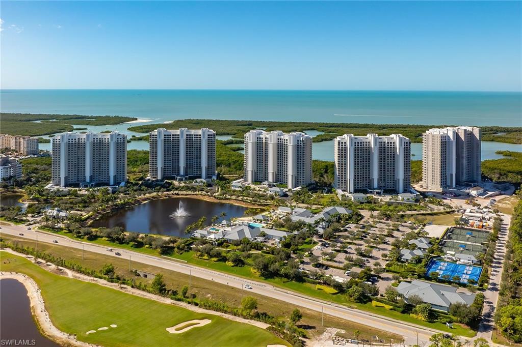13935 Old Coast Road, Unit 2206 Naples, FL 34110 - Photo 31 of 50 Ariel view of Kalea Bay: Five Towers, The Club at Kalea Bay, Twelve Guest Cottages, Tennis with Pro Shop, Racquet Ball, Bocce and the Kinsale Golf Club across the street