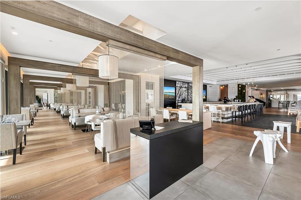 13935 Old Coast Road, Unit 2206 Naples, FL 34110 - Photo 35 of 50 Salt and Oak Sophisticated Dining amid warm contemporary design. Perfect for entertaining, gatherings, and relaxed evenings with friends