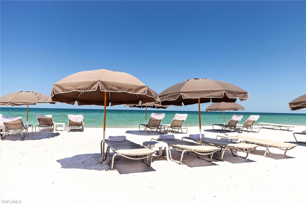 13935 Old Coast Road, Unit 2206 Naples, FL 34110 - Photo 40 of 50 The optional Beach club offers beachfront dining, along with full chair, umbrella, towel, and food-and-beverage service on the beach