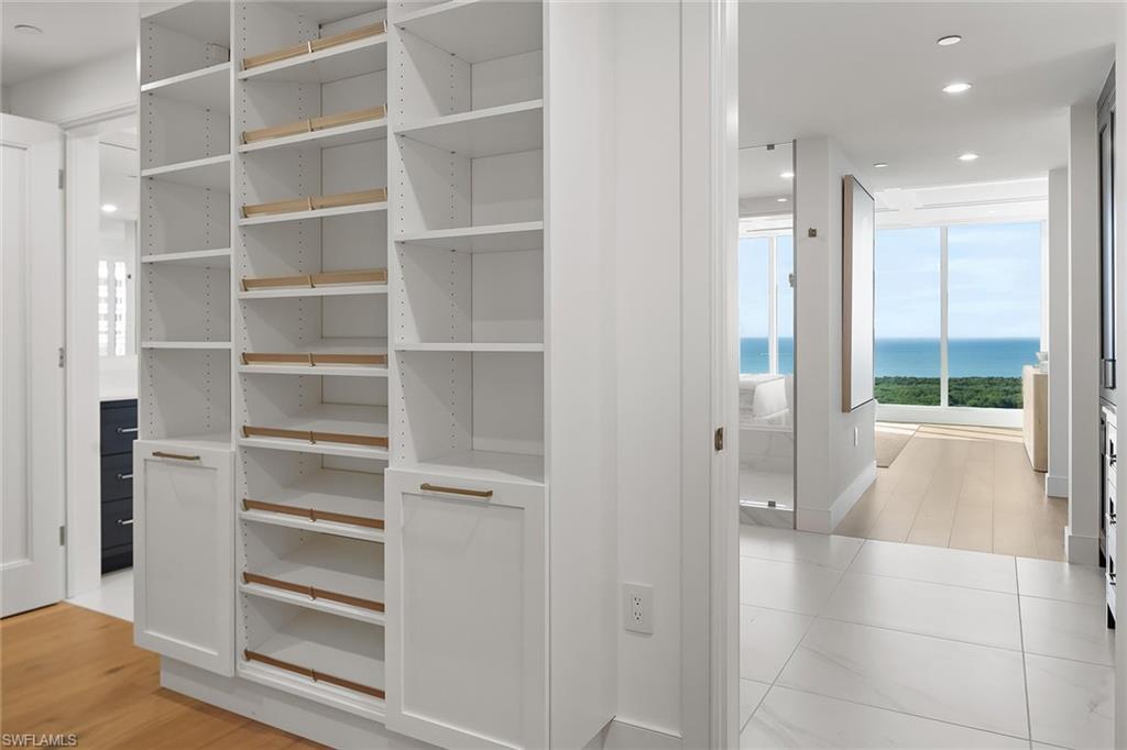 13935 Old Coast Road, Unit 2206 Naples, FL 34110 - Photo 49 of 50 Generously Sized Custom Primary Closet