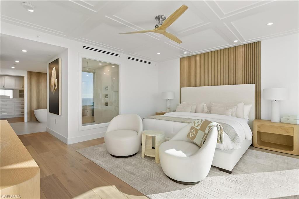 13935 Old Coast Road, Unit 2206 Naples, FL 34110 - Photo 10 of 50 Serene primary ensuite retreat features a glass shower window, opening the shower to the view