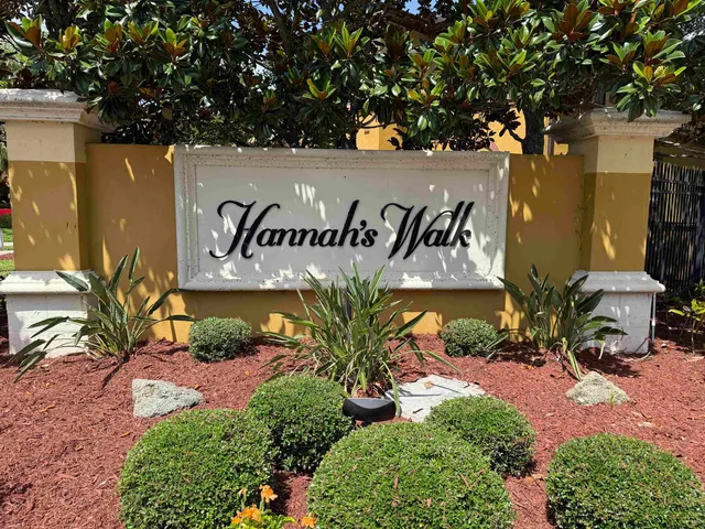 a sign that is next to a road