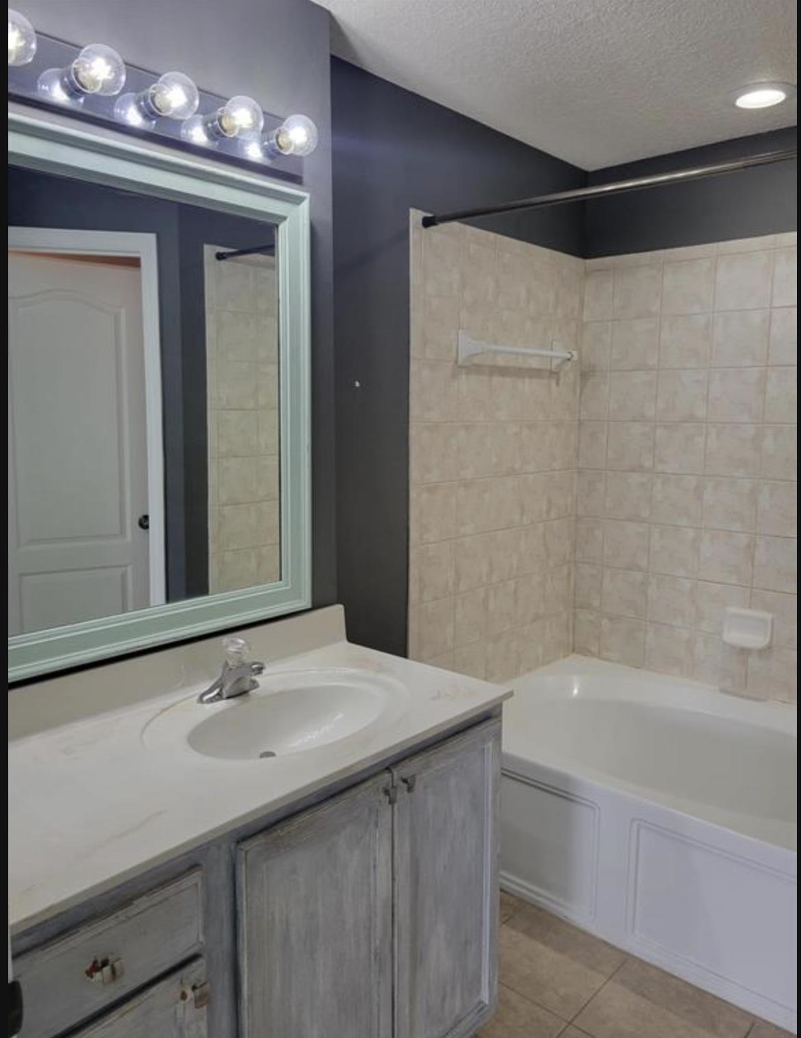 5 Rachel Court St. Augustine, FL 32080 - Photo 12 of 15 a bathroom with a bathtub and a sink