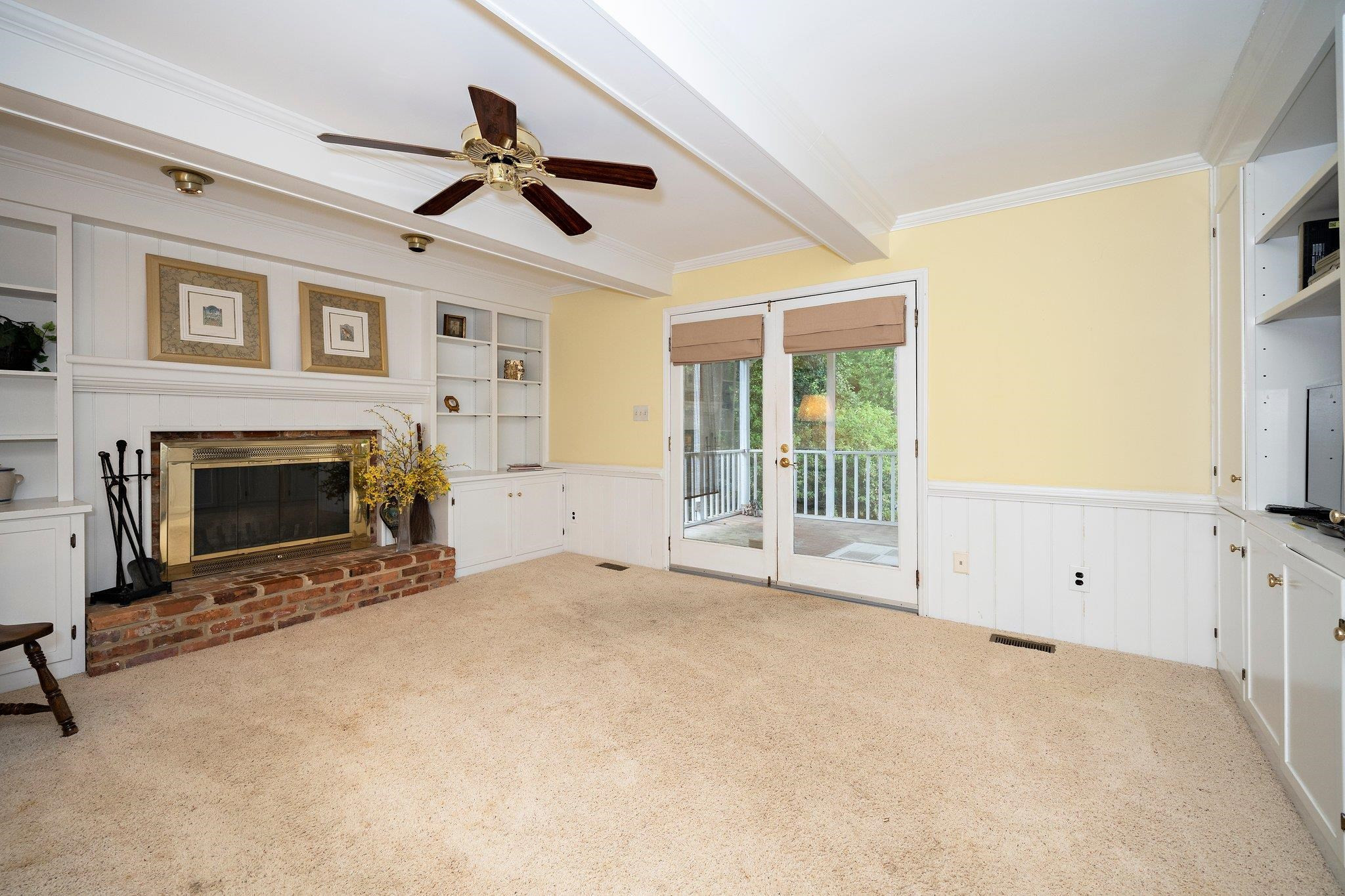 1512 Pony Run Road Raleigh, NC 27615 - Photo 16 of 39 Easy Flow Family Room has 2 Separate Built-in Cabinetry + Exit Door that goes Directly to Screened Porch. Family Room