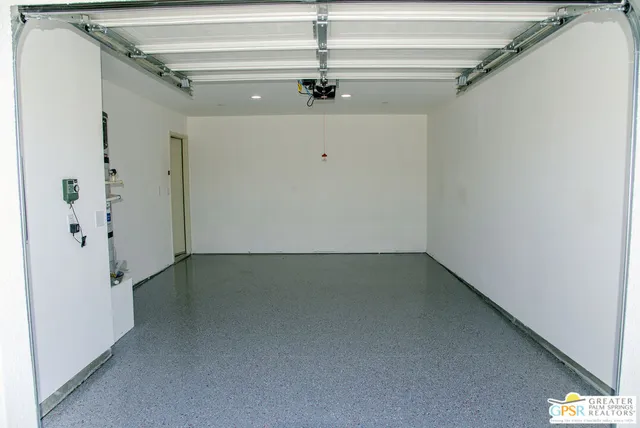 a view of a hallway with a chandelier