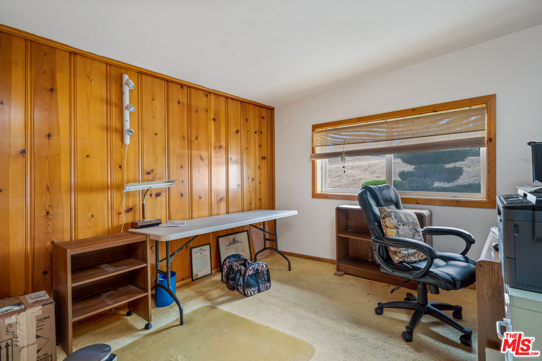 20734 Las Flores Mesa Drive Malibu, CA 90265 - Photo 13 of 23 a view of a workspace with furniture and a window