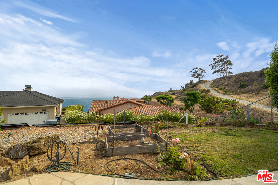 20734 Las Flores Mesa Drive Malibu, CA 90265 - Photo 17 of 23 a view of a houses with outdoor space