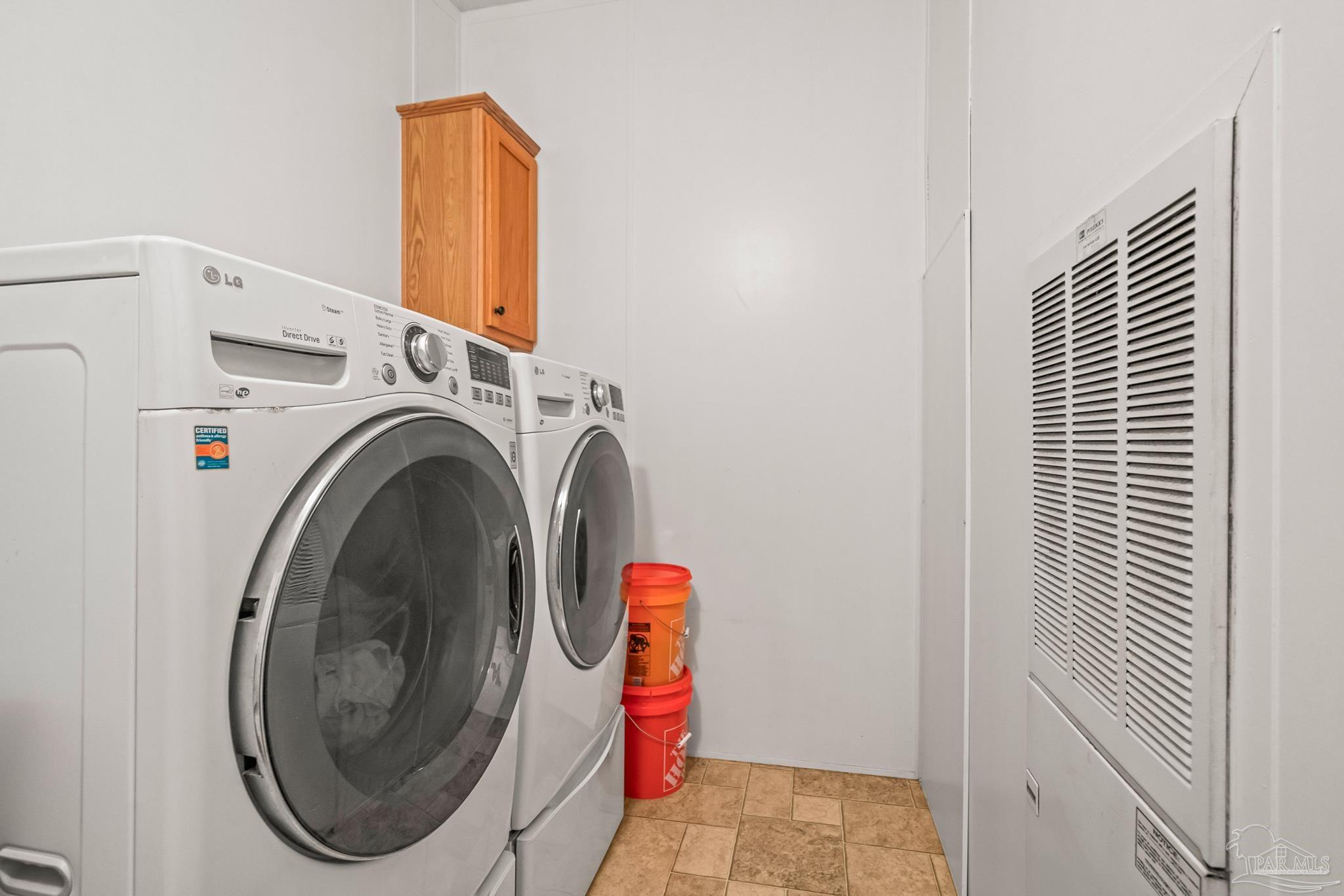 5105 April Lane Pace, FL 32571 - Photo 48 of 57 a utility room with dryer and washer
