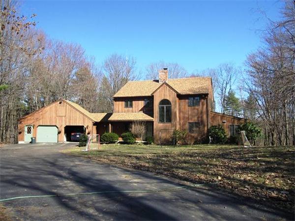 280 Mountain Road Gill, MA 01354 - Photo 1 of 26 a front view of a house with a yard