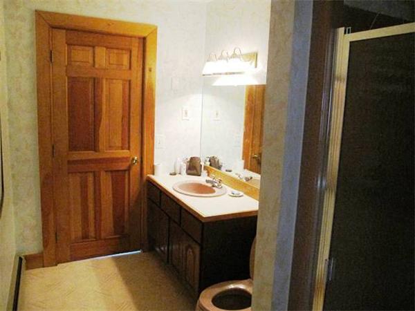 280 Mountain Road Gill, MA 01354 - Photo 19 of 26 a bathroom with a sink and a mirror