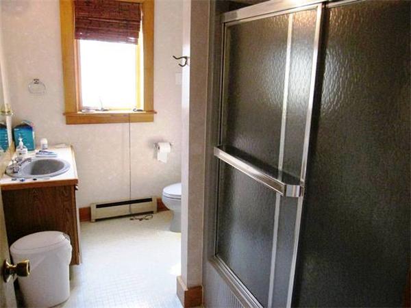 280 Mountain Road Gill, MA 01354 - Photo 20 of 26 a bathroom with a toilet and a sink