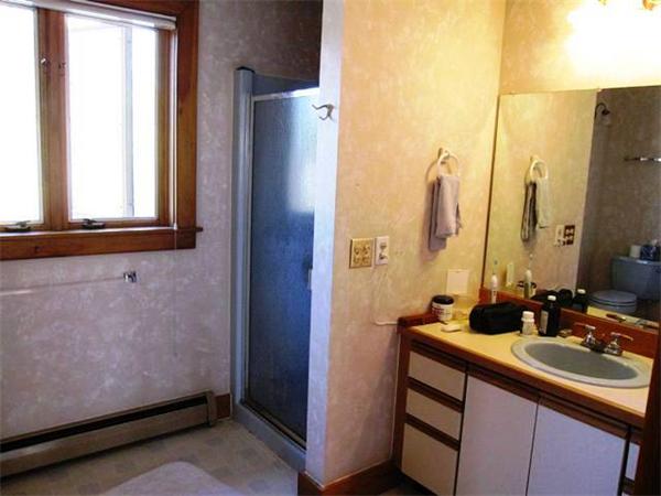 280 Mountain Road Gill, MA 01354 - Photo 21 of 26 a bathroom with a double vanity sink and a mirror