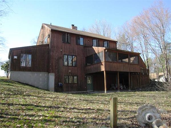 280 Mountain Road Gill, MA 01354 - Photo 3 of 26 a view of a house with a yard