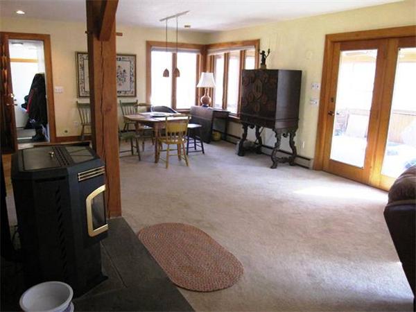 280 Mountain Road Gill, MA 01354 - Photo 8 of 26 a view of a livingroom with furniture and a large window