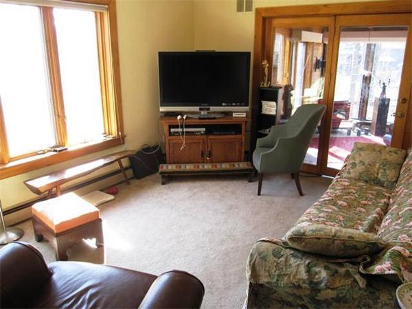 280 Mountain Road Gill, MA 01354 - Photo 10 of 26 a living room with furniture and a flat screen tv