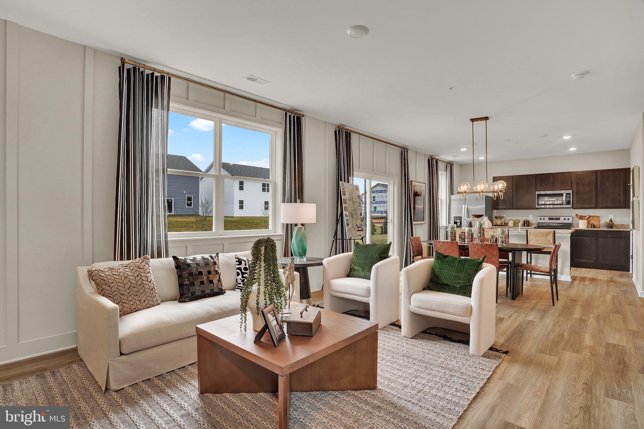 301 Eclipse Street Ranson, WV 25438 - Photo 12 of 26 a living room with furniture and a large window