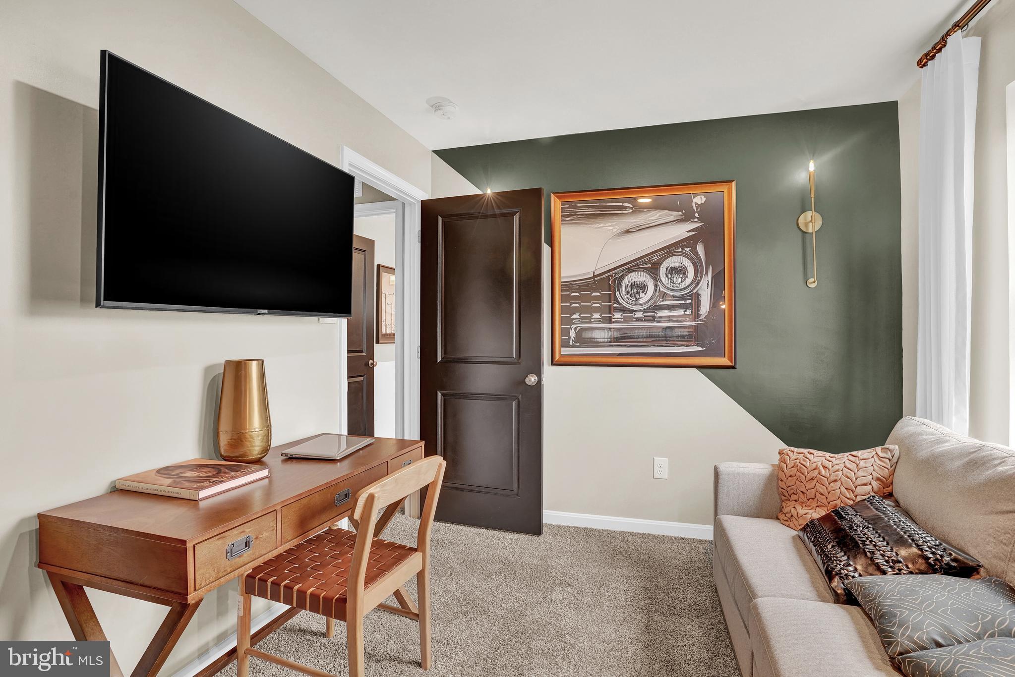 301 Eclipse Street Ranson, WV 25438 - Photo 15 of 26 a living room with furniture and a flat screen tv
