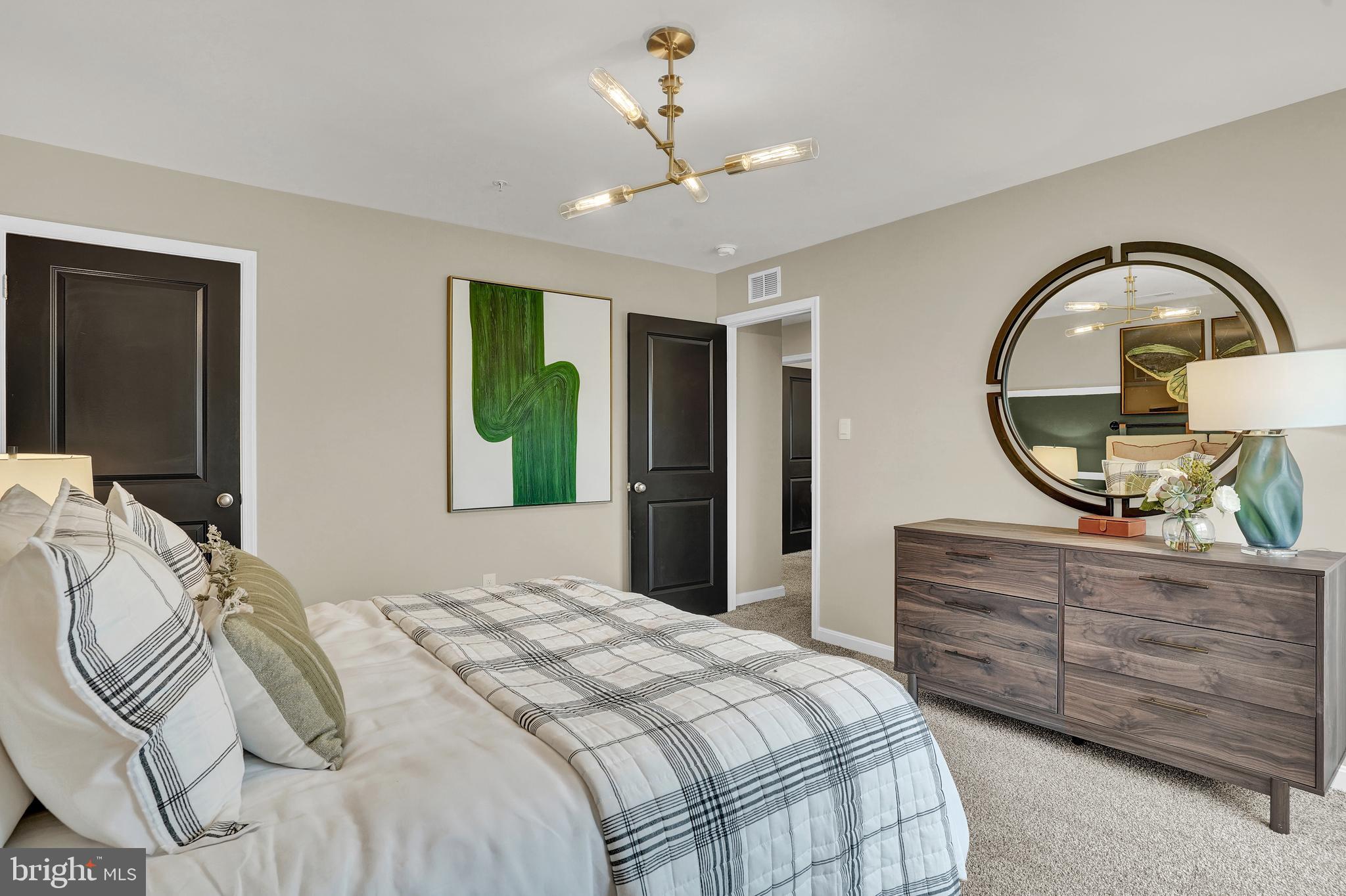 301 Eclipse Street Ranson, WV 25438 - Photo 24 of 26 a bedroom with a bed and a dresser