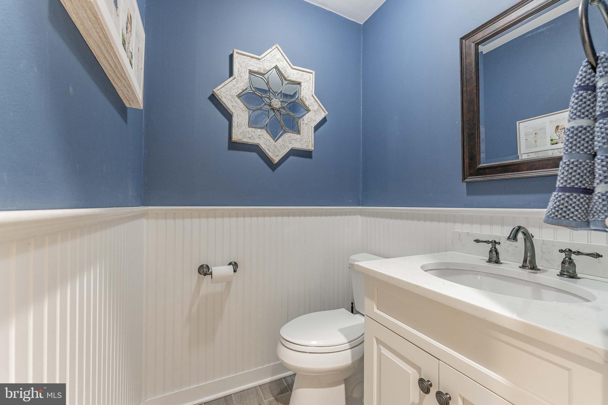 111 Harrogate Road Wynnewood, PA 19096 - Photo 13 of 60 a bathroom with a sink toilet and mirror