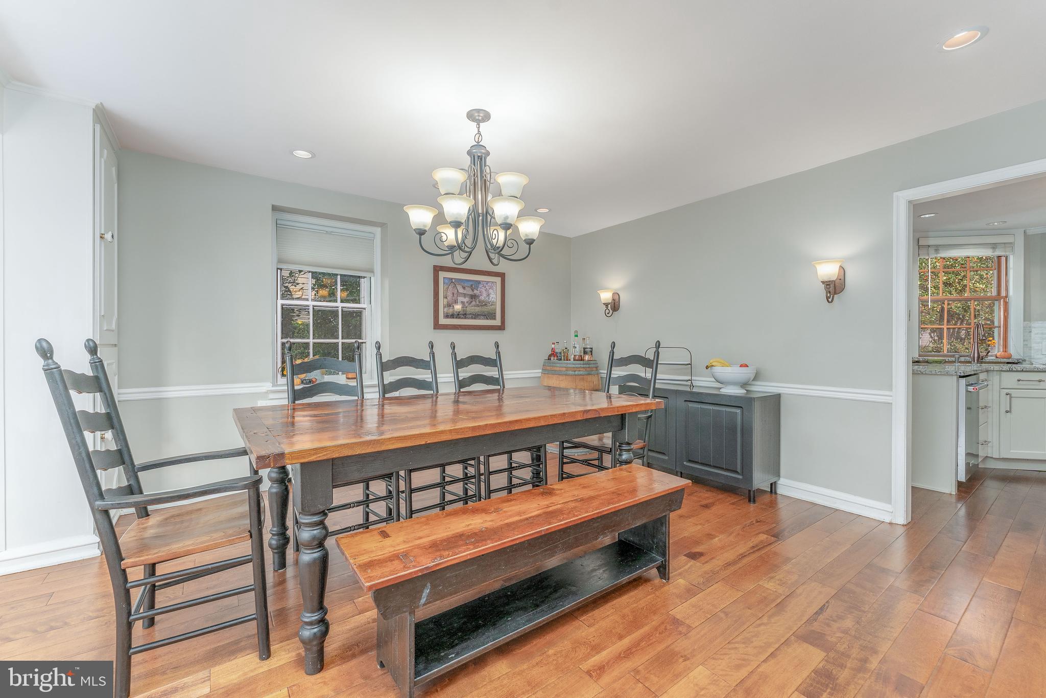 111 Harrogate Road Wynnewood, PA 19096 - Photo 14 of 60 a view of a dining room with furniture and wooden floor