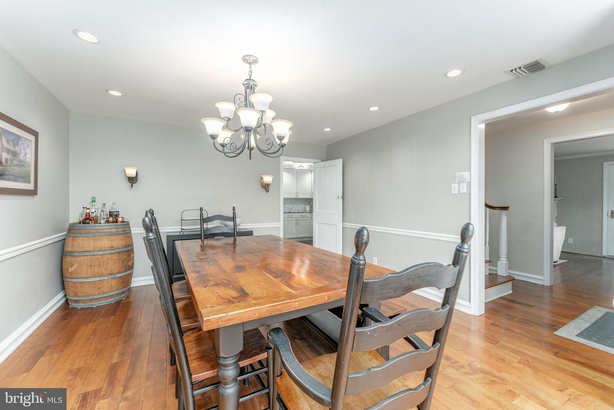 111 Harrogate Road Wynnewood, PA 19096 - Photo 16 of 60 a view of a dining room with furniture and wooden floor