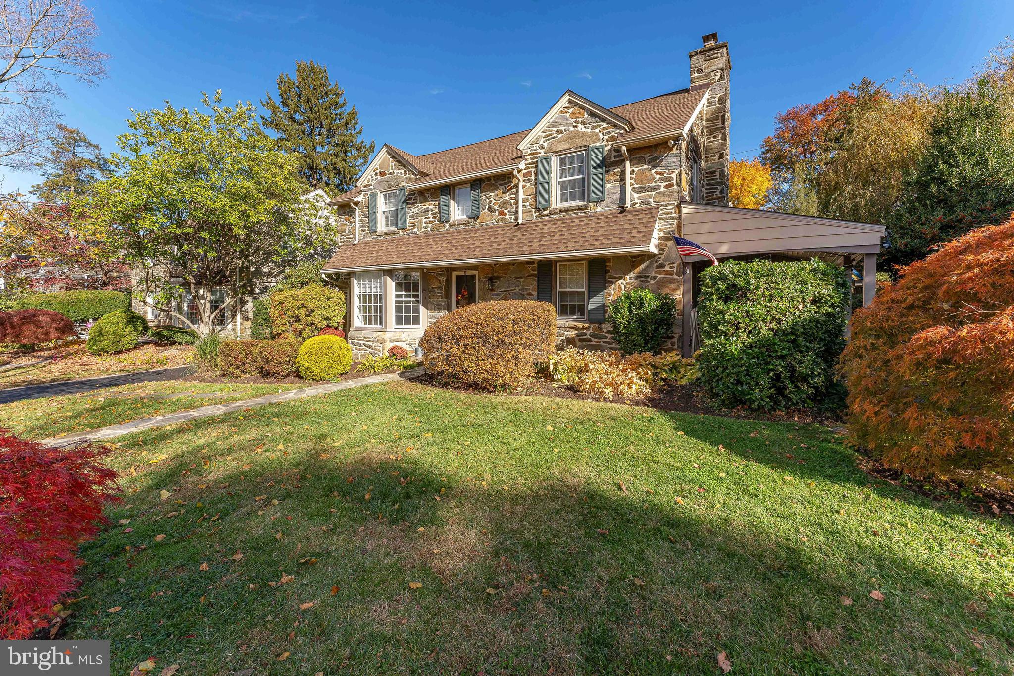 111 Harrogate Road Wynnewood, PA 19096 - Photo 2 of 60 a front view of a house with a garden